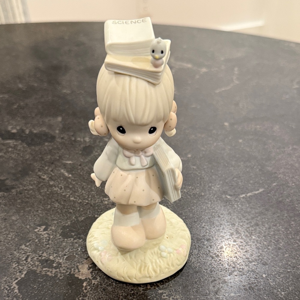 Precious Moments Cream and White Figurine with Book